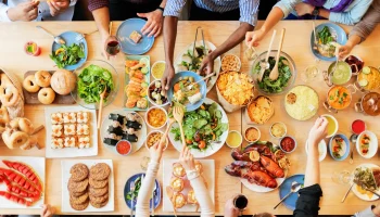 Diverse,Group,Enjoying,A,Colorful,Feast.,Top,View,Of,A