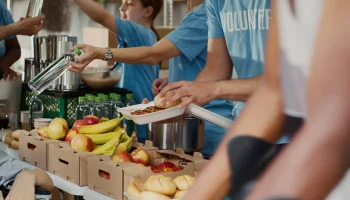 At,Food,Drive,,Poor,Female,Wheelchair,User,Receives,Free,Food